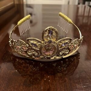 Gold princess crown with pink and purple accents